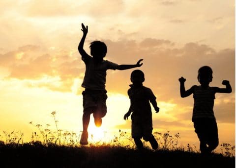 Children playing in the sunlight